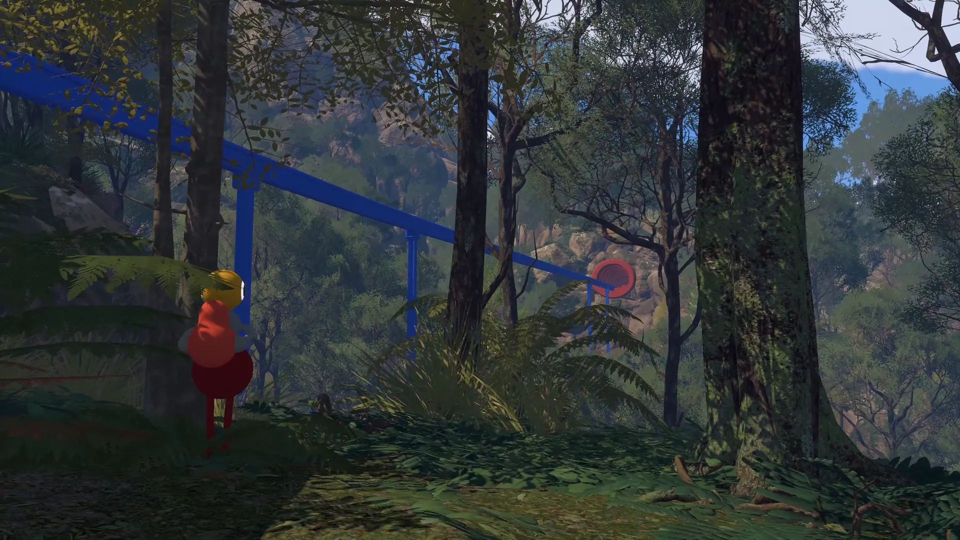 A yellow-headed friend following the railway through a forest.