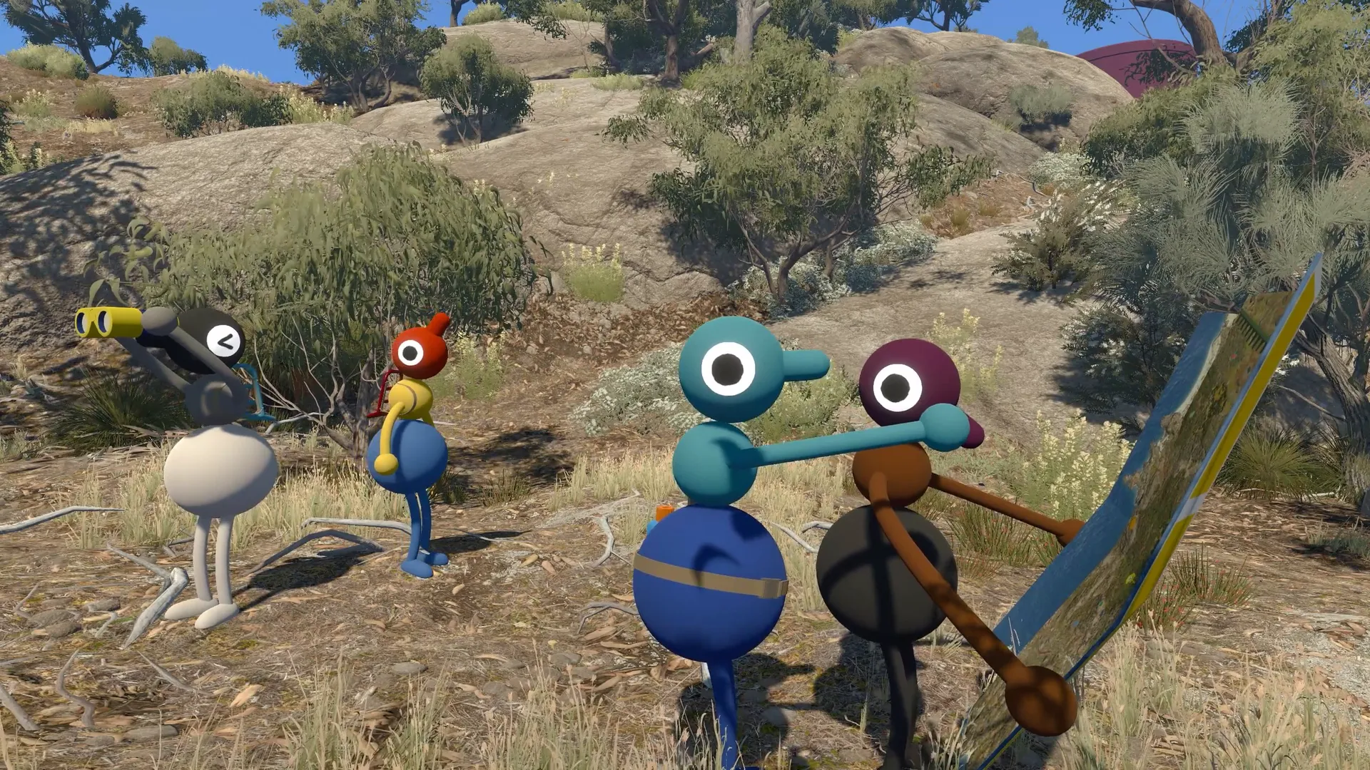 Friends playing with an oversized pair of binoculars.